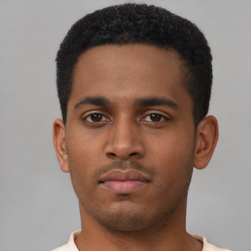 Neutral latino young-adult male with short  brown hair and brown eyes