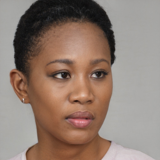 Neutral black young-adult female with short  brown hair and brown eyes