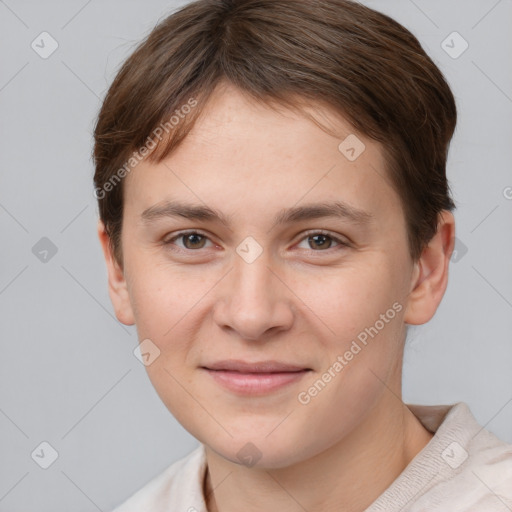 Joyful white young-adult female with short  brown hair and brown eyes