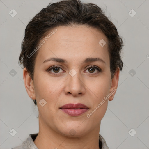 Joyful white adult female with short  brown hair and brown eyes