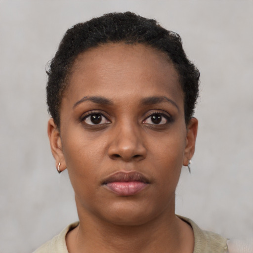 Neutral black young-adult female with short  black hair and brown eyes