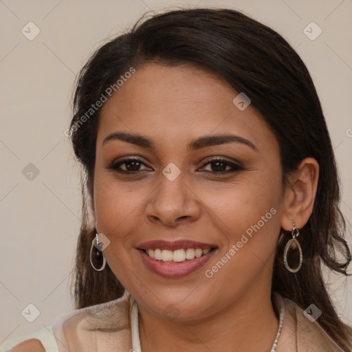 Joyful white young-adult female with long  brown hair and brown eyes