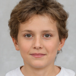 Joyful white child female with short  brown hair and brown eyes