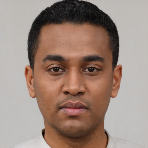 Neutral latino young-adult male with short  black hair and brown eyes