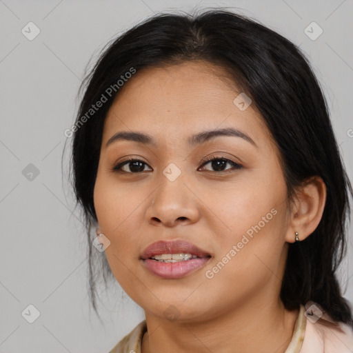 Joyful asian young-adult female with medium  brown hair and brown eyes