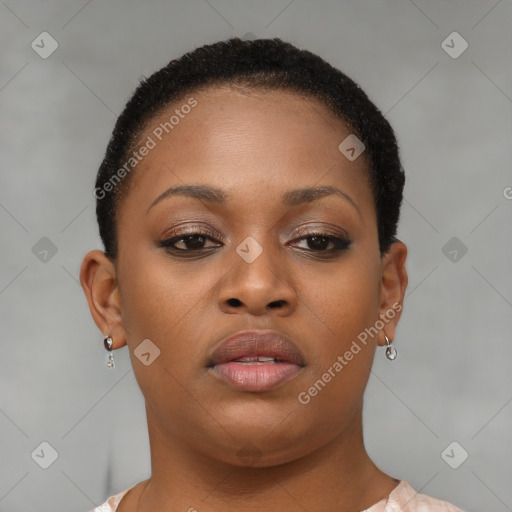 Joyful black young-adult female with short  brown hair and brown eyes