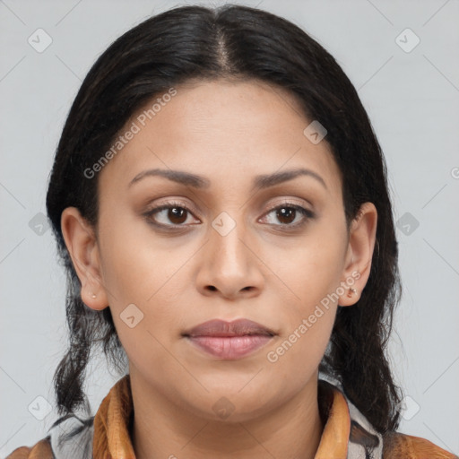 Joyful latino young-adult female with medium  brown hair and brown eyes