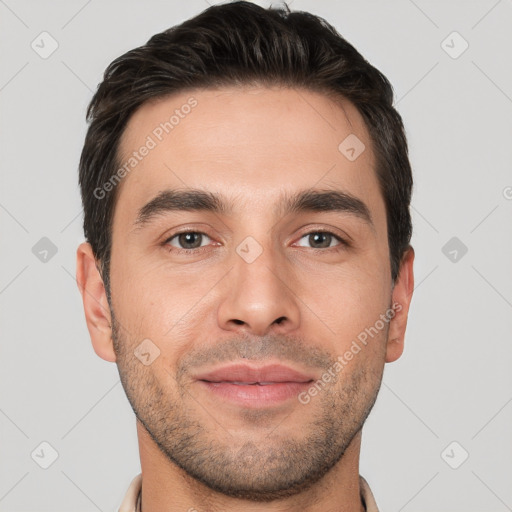 Joyful white young-adult male with short  brown hair and brown eyes