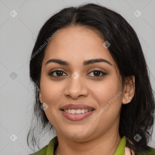 Joyful latino young-adult female with medium  black hair and brown eyes