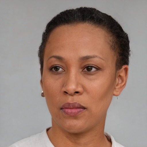 Neutral black adult female with short  brown hair and brown eyes