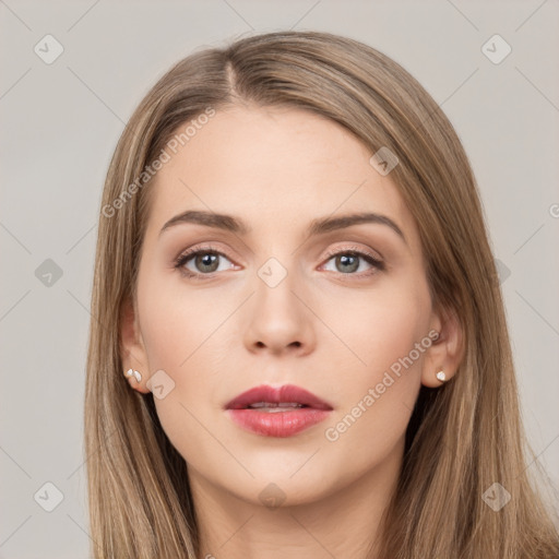 Neutral white young-adult female with long  brown hair and brown eyes