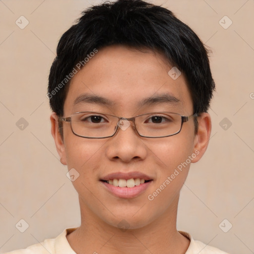 Joyful asian young-adult male with short  brown hair and brown eyes