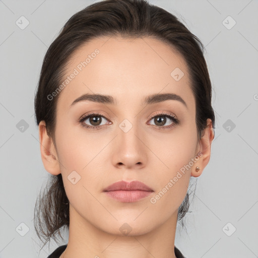 Neutral white young-adult female with medium  brown hair and brown eyes