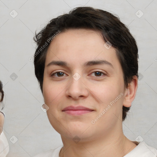 Joyful white young-adult female with medium  brown hair and brown eyes