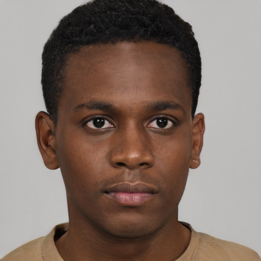 Neutral black young-adult male with short  brown hair and brown eyes