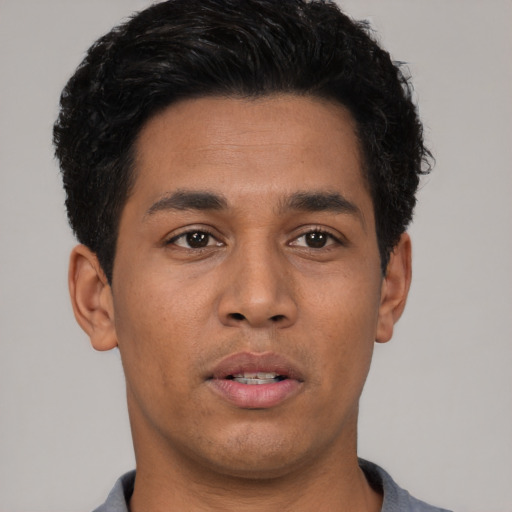 Neutral latino young-adult male with short  brown hair and brown eyes
