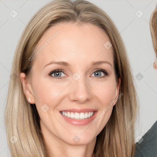 Joyful white young-adult female with long  brown hair and grey eyes