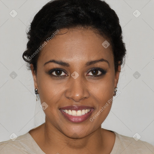 Joyful black young-adult female with short  black hair and brown eyes