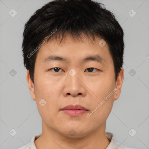 Neutral asian young-adult male with short  brown hair and brown eyes