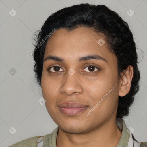 Joyful latino young-adult female with medium  black hair and brown eyes