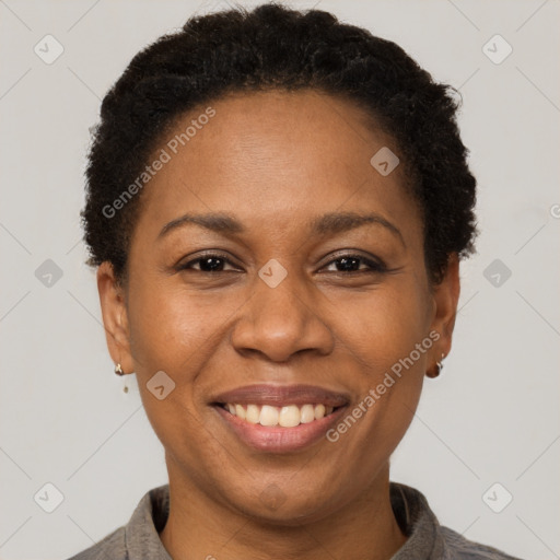 Joyful latino adult female with short  brown hair and brown eyes