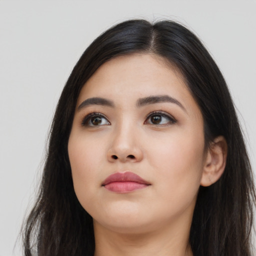 Neutral latino young-adult female with long  black hair and brown eyes