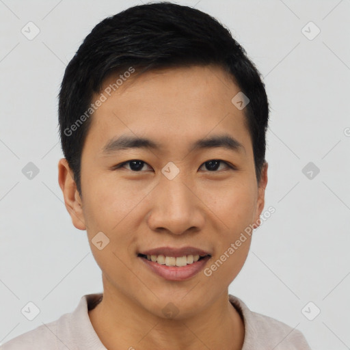 Joyful asian young-adult male with short  black hair and brown eyes