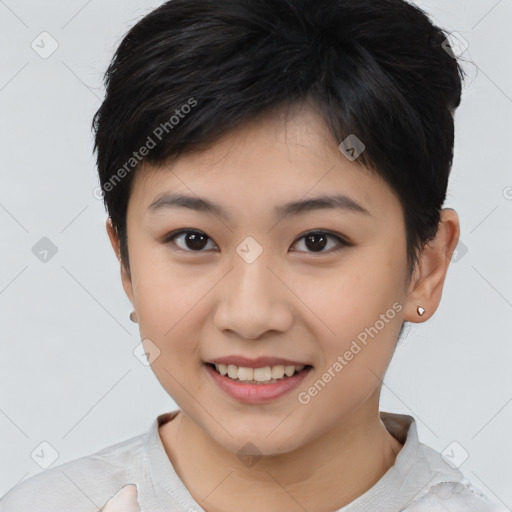 Joyful asian young-adult female with short  brown hair and brown eyes