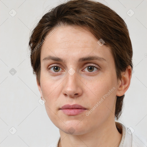 Neutral white young-adult female with short  brown hair and grey eyes