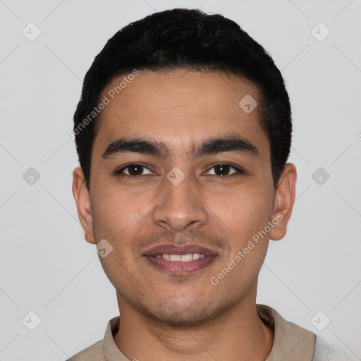 Joyful latino young-adult male with short  black hair and brown eyes