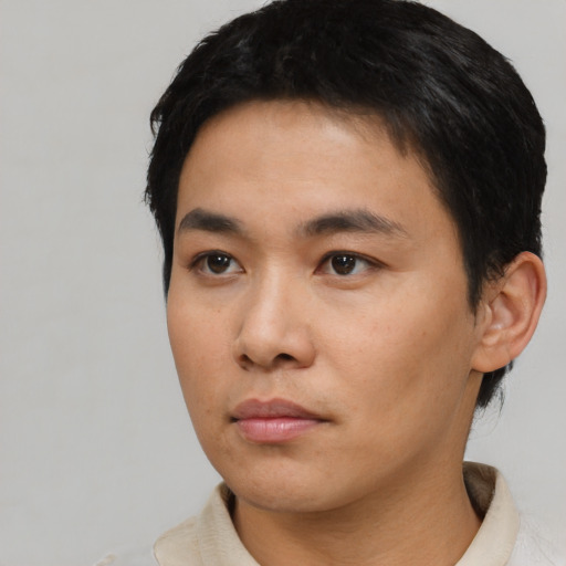 Neutral asian young-adult male with short  black hair and brown eyes