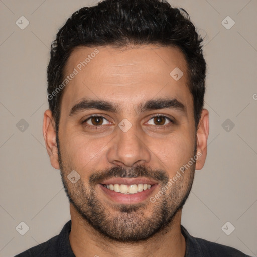 Joyful white young-adult male with short  black hair and brown eyes