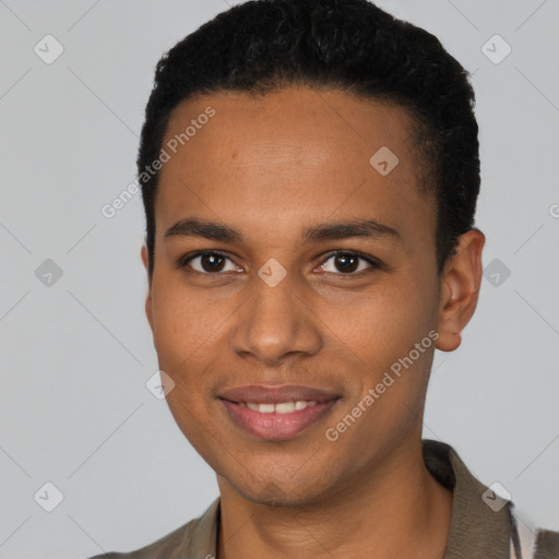 Joyful black young-adult male with short  black hair and brown eyes