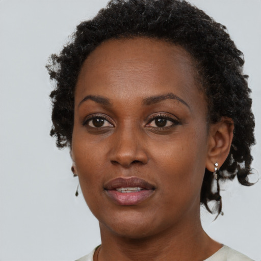 Neutral black young-adult female with short  brown hair and brown eyes