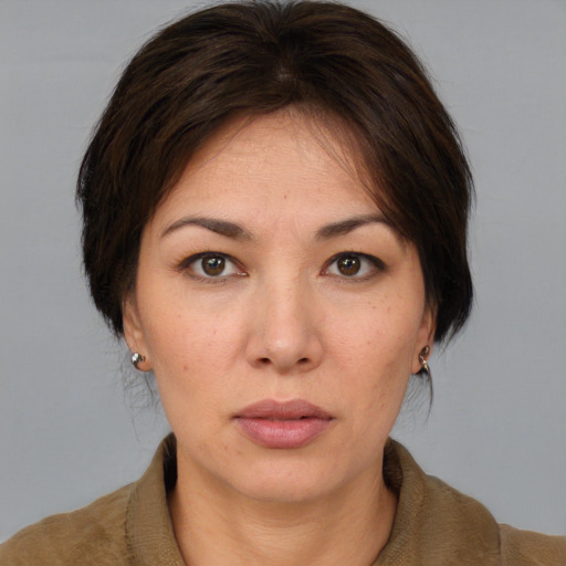 Neutral white adult female with medium  brown hair and brown eyes