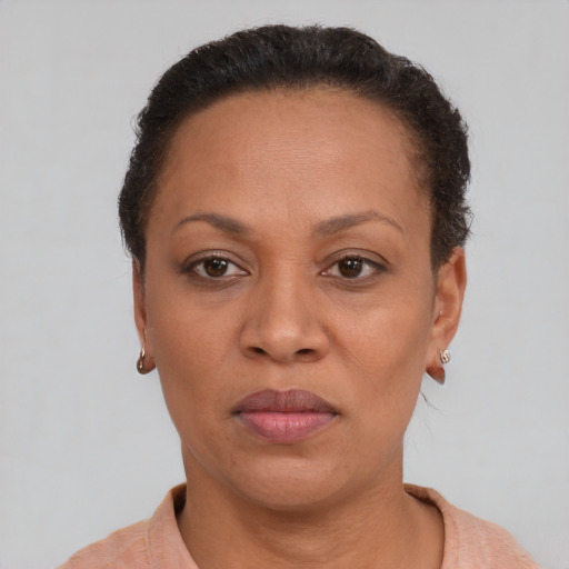 Neutral black adult female with short  brown hair and brown eyes