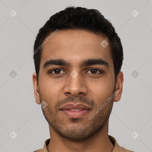 Neutral latino young-adult male with short  black hair and brown eyes