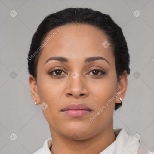 Joyful latino young-adult female with short  brown hair and brown eyes