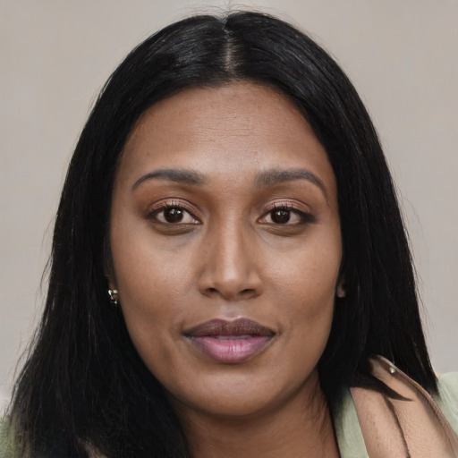 Joyful asian young-adult female with long  black hair and brown eyes