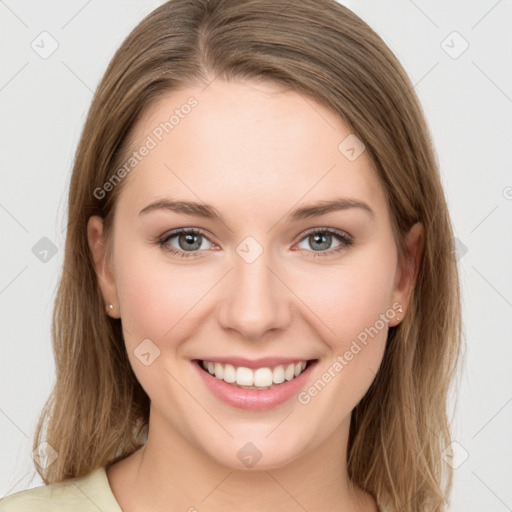 Joyful white young-adult female with long  brown hair and grey eyes