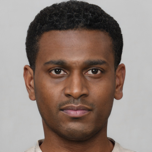 Neutral black young-adult male with short  brown hair and brown eyes