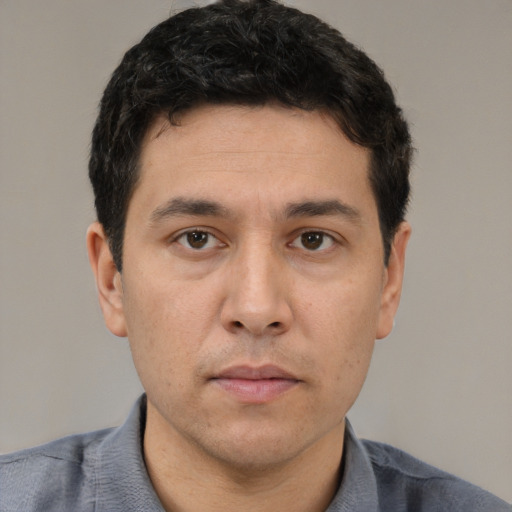 Neutral white young-adult male with short  black hair and brown eyes