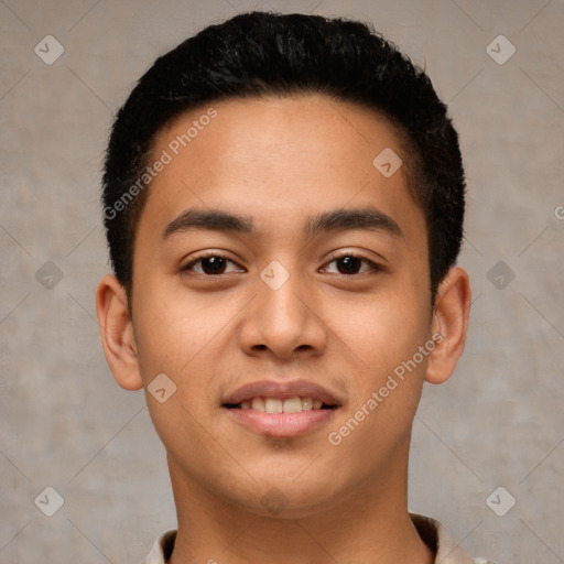 Joyful latino young-adult male with short  black hair and brown eyes