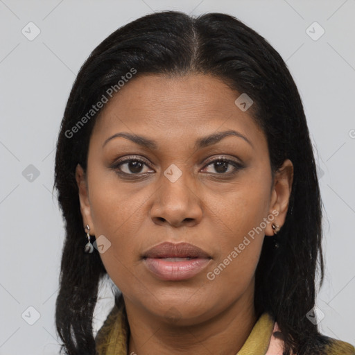 Joyful latino young-adult female with long  brown hair and brown eyes