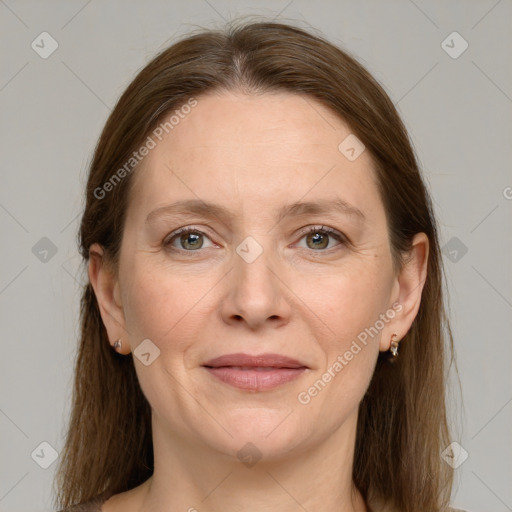 Joyful white adult female with medium  brown hair and grey eyes