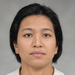 Neutral asian young-adult female with medium  brown hair and brown eyes