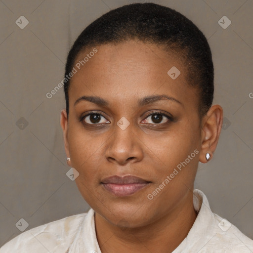 Joyful black young-adult female with short  brown hair and brown eyes