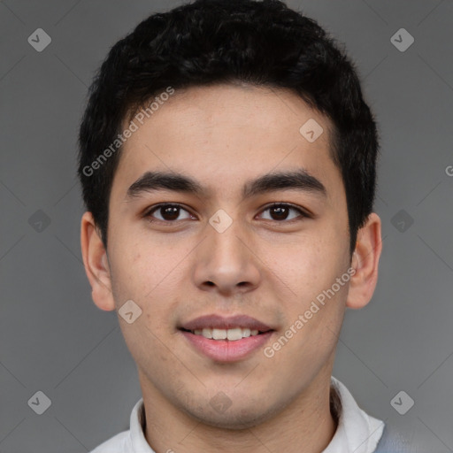 Joyful latino young-adult male with short  black hair and brown eyes