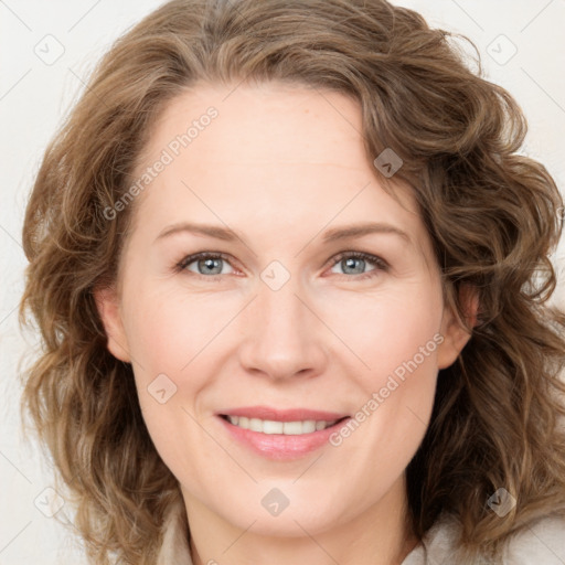 Joyful white young-adult female with medium  brown hair and blue eyes