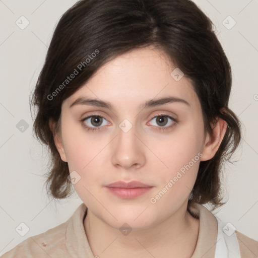 Neutral white young-adult female with medium  brown hair and brown eyes